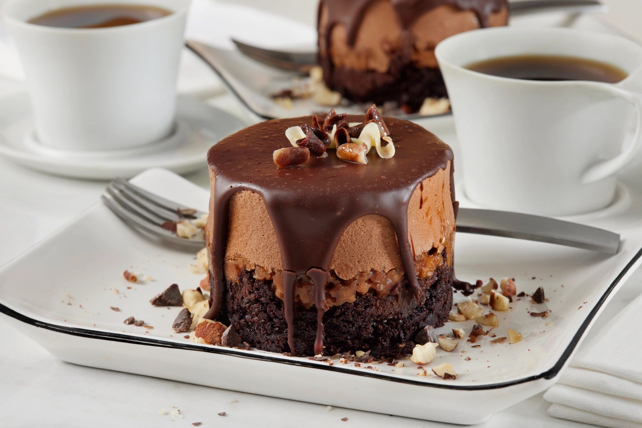 Chocolate mousse cake slice on a plate