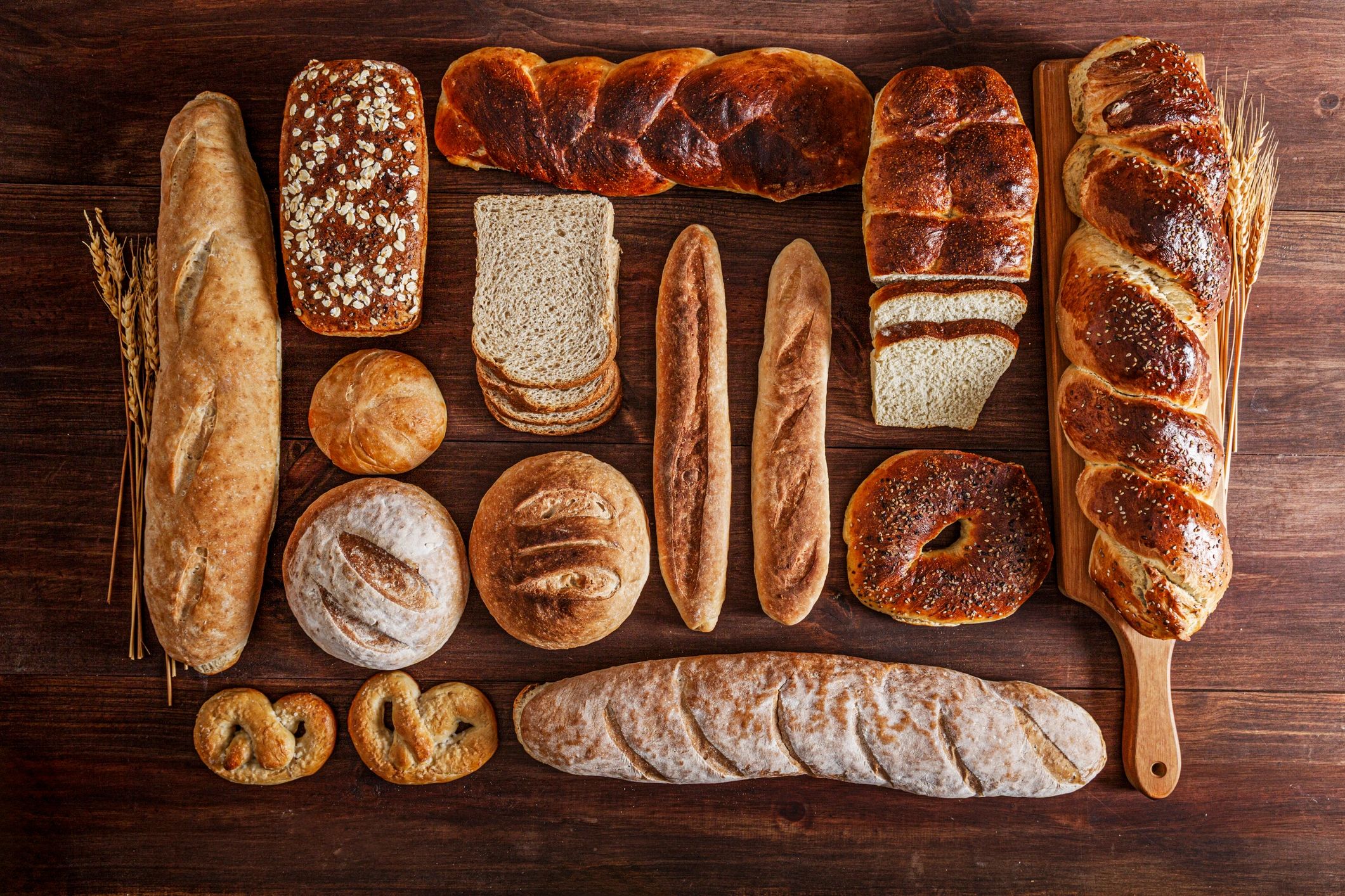 Assortment of artisan bread on a rustic wooden table